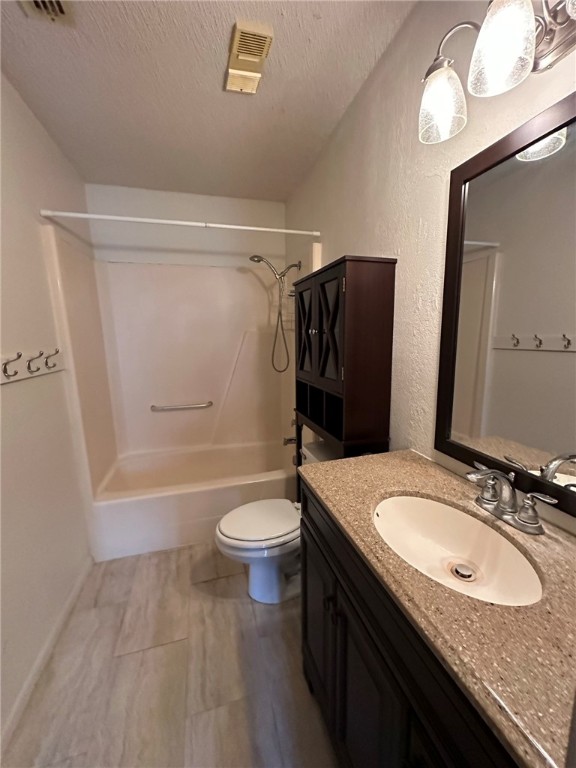 4229 Interstate Highway, Unit 4 Corpus Christi, TX 78410 - Photo 8 of 12 a bathroom with a granite countertop sink toilet and shower