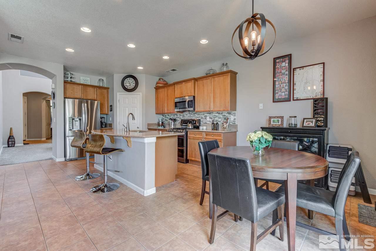 9275 Hummer Drive Reno, NV 89521 - Photo 13 of 33 a view of a dining room with furniture