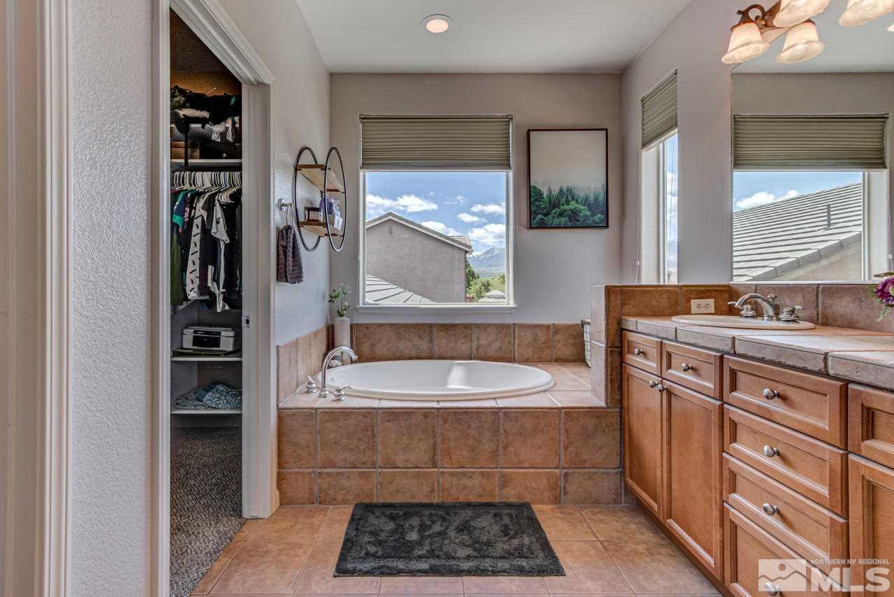 9275 Hummer Drive Reno, NV 89521 - Photo 24 of 33 a bathroom with a sink and a mirror