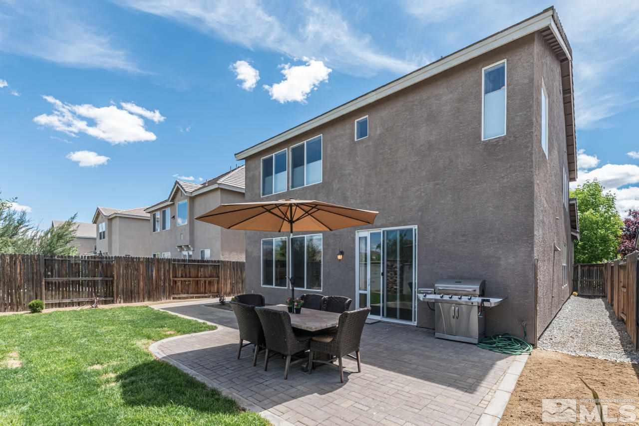 9275 Hummer Drive Reno, NV 89521 - Photo 33 of 33 a view of a house with backyard and sitting area
