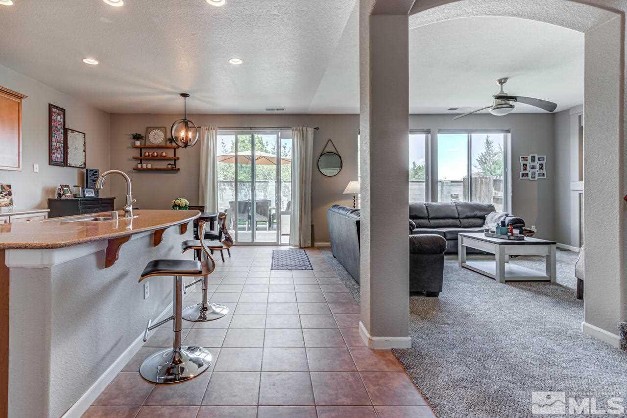 9275 Hummer Drive Reno, NV 89521 - Photo 5 of 33 a room with stainless steel appliances lots of counter top space and furniture
