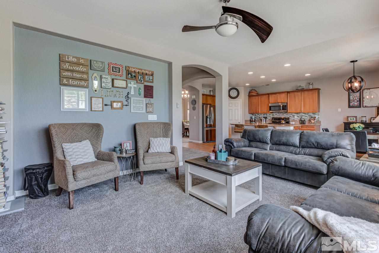 9275 Hummer Drive Reno, NV 89521 - Photo 9 of 33 a living room with furniture and a ceiling fan