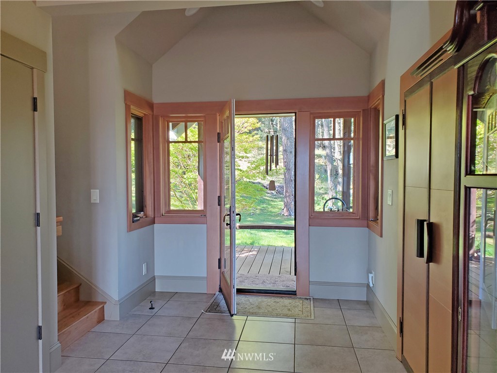 400 Cormorant Bay Road Orcas Island, WA 98245 - Photo 12 of 39 a view of an entryway and livingroom