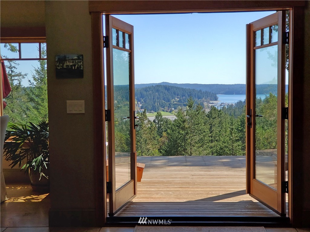 400 Cormorant Bay Road Orcas Island, WA 98245 - Photo 15 of 39 a view of a door and a window