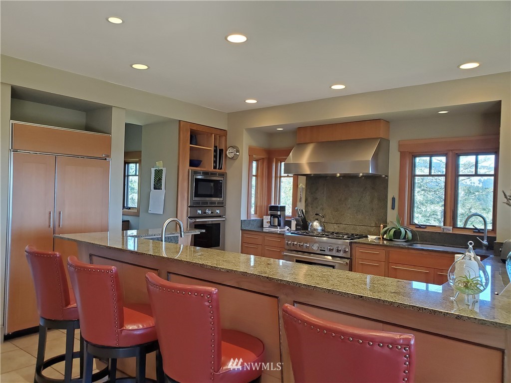 400 Cormorant Bay Road Orcas Island, WA 98245 - Photo 20 of 39 a kitchen with counter space cabinets and appliances