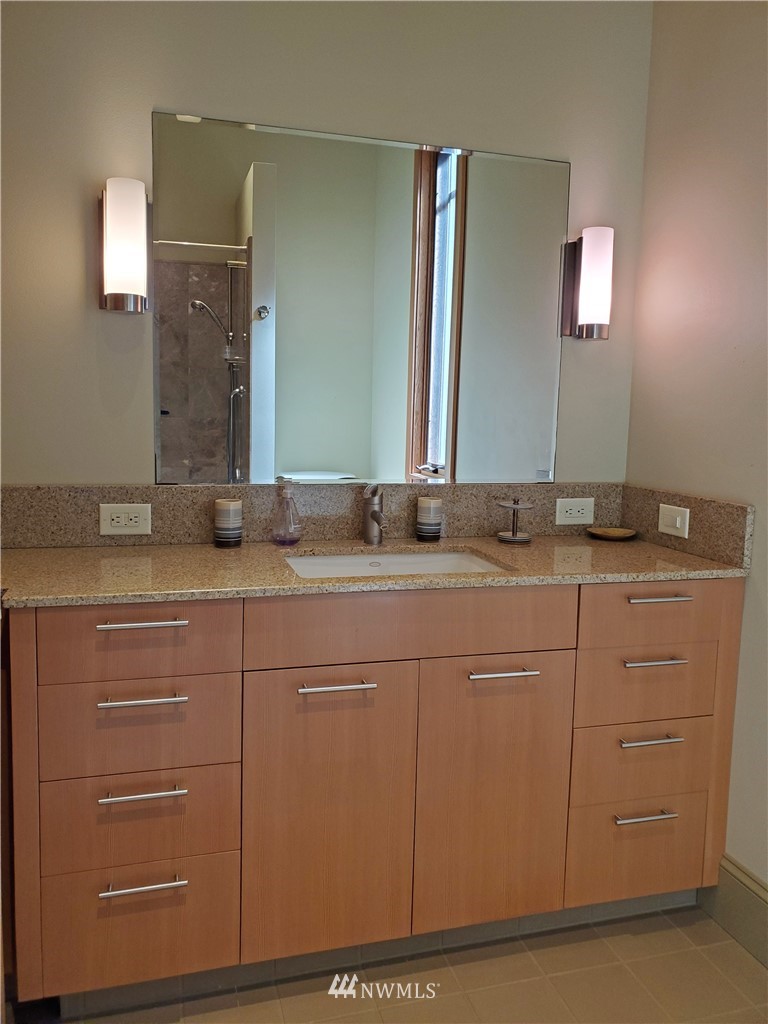 400 Cormorant Bay Road Orcas Island, WA 98245 - Photo 28 of 39 a bathroom with a sink and a mirror