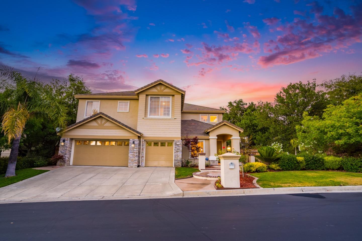 5793 Cannes Place San Jose, CA 95138 - Photo 1 of 29 a front view of a house with a yard and garage