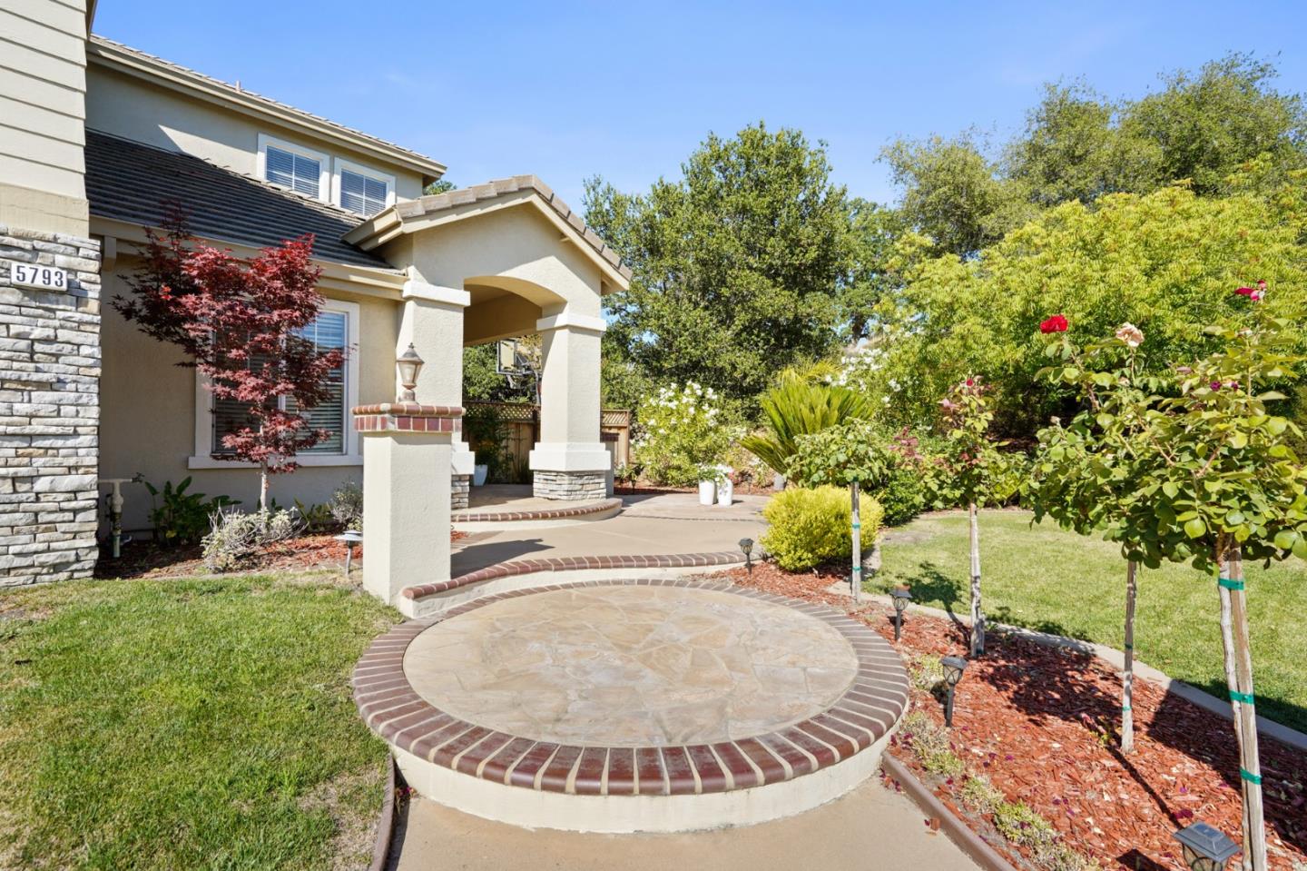 5793 Cannes Place San Jose, CA 95138 - Photo 2 of 29 a view of a house with outdoor space and garden