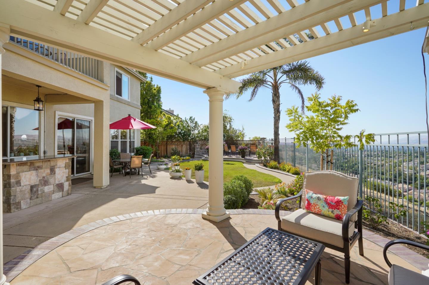 5793 Cannes Place San Jose, CA 95138 - Photo 23 of 29 a building outdoor space with patio furniture and potted plants