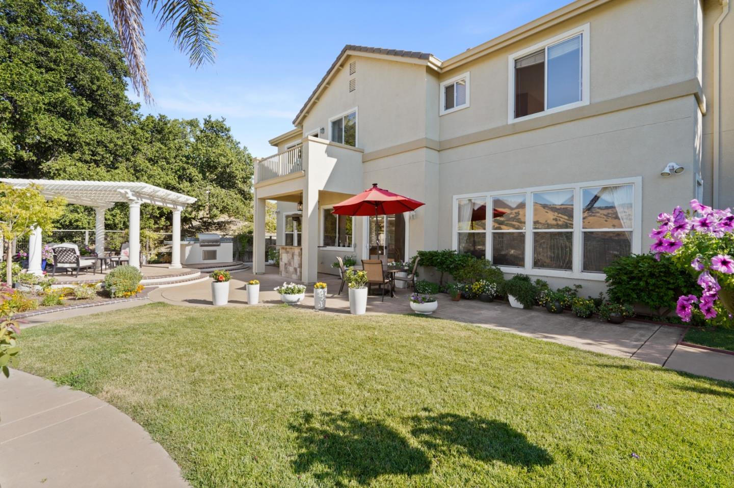 5793 Cannes Place San Jose, CA 95138 - Photo 24 of 29 a view of a house with swimming pool and sitting area