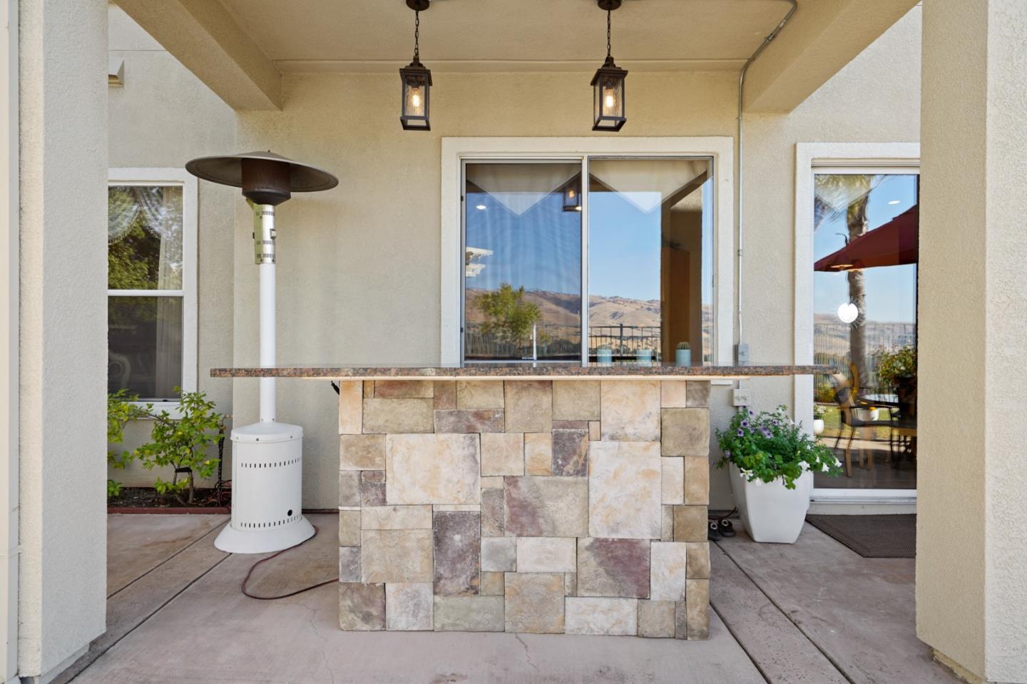 5793 Cannes Place San Jose, CA 95138 - Photo 25 of 29 a view of a chairs and table in the patio
