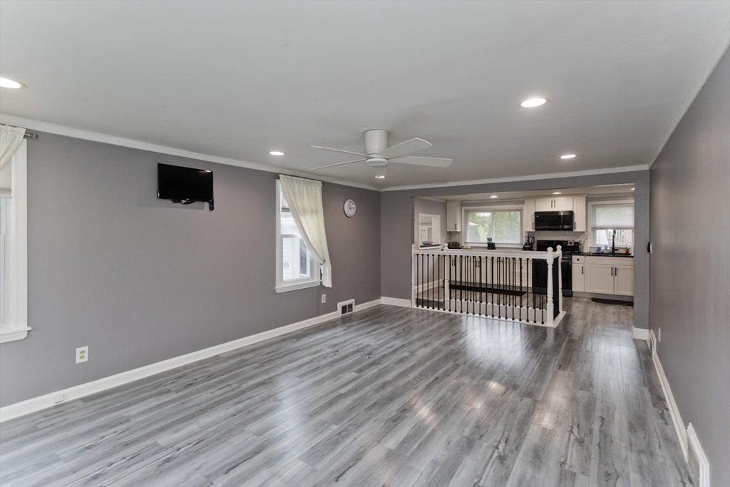 83 Chalmers Street Springfield, MA 01118 - Photo 11 of 40 a view of kitchen with cabinets and wooden floor