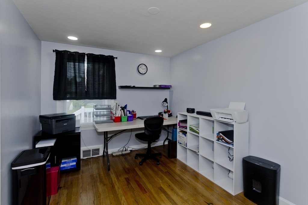 83 Chalmers Street Springfield, MA 01118 - Photo 35 of 40 a room with furniture and wooden floor