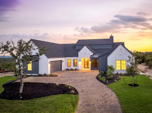 a sign that is sitting in a forest