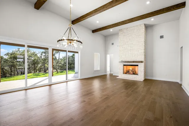 a kitchen with a sink a counter space and cabinets