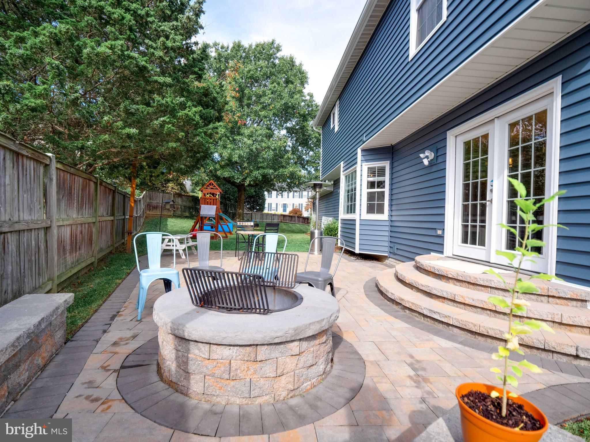 1431 Kingsvale Circle Herndon, VA 20170 - Photo 5 of 66 Back patio with built-in firepit