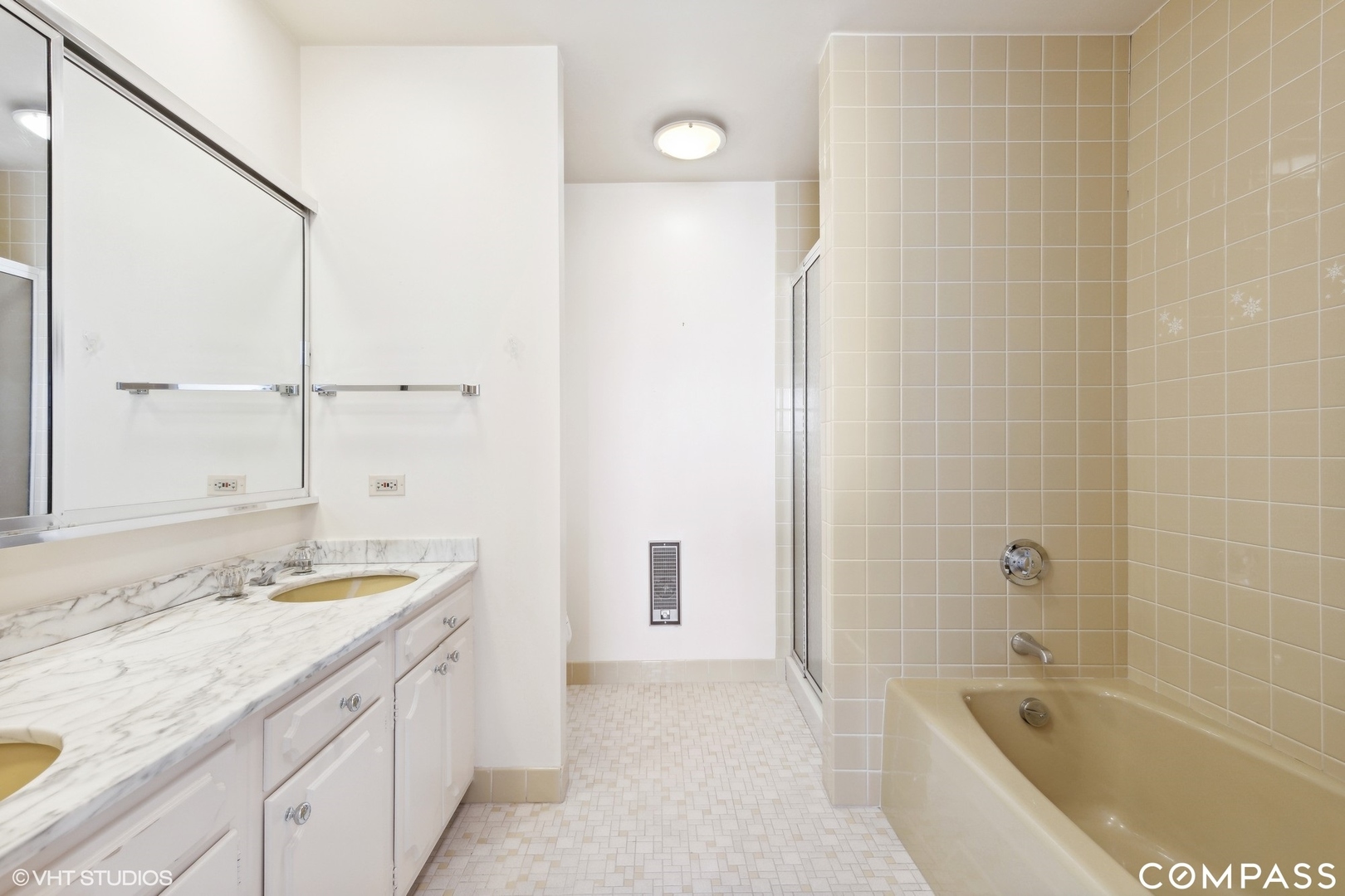 1500 Sheridan Road, Unit 9K Wilmette, IL 60091 - Photo 22 of 29 a bathroom with a granite countertop sink a toilet and shower