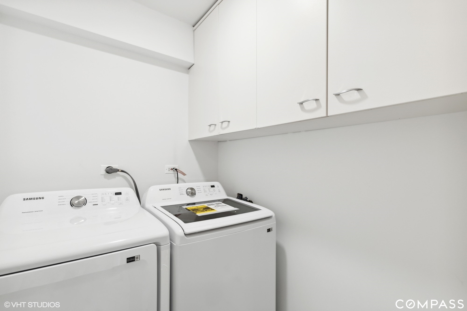 1500 Sheridan Road, Unit 9K Wilmette, IL 60091 - Photo 23 of 29 a utility room with dryer and washer