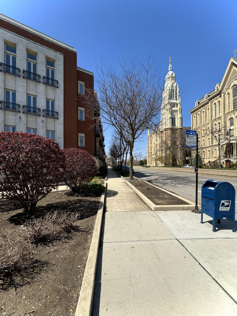1075 West Roosevelt Road, Unit 305 Chicago, IL 60608 - Photo 2 of 23 a view of a street with a building in the background