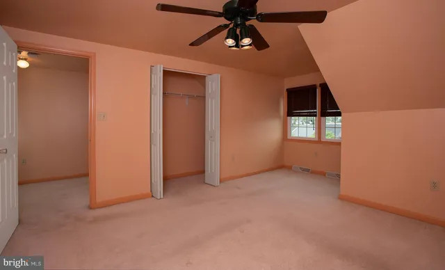 an aerial view of a house with a balcony