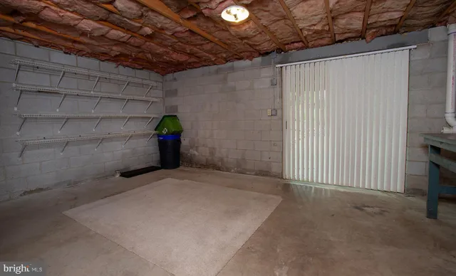 a view of a backyard with sitting area