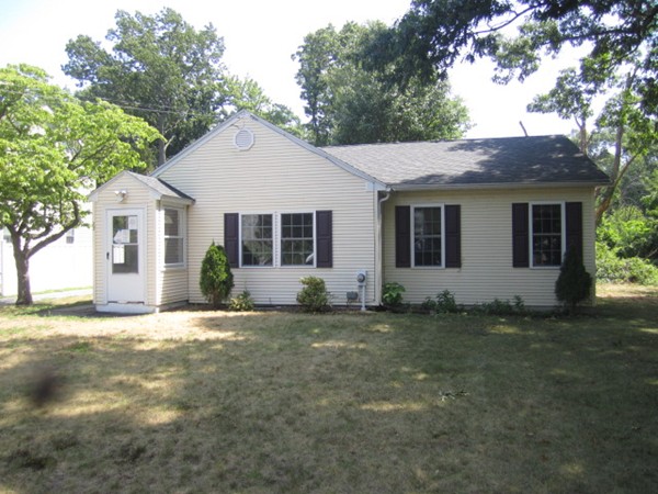 93 Stuart Street Springfield, MA 01119 - Photo 1 of 24 a view of a house with a yard