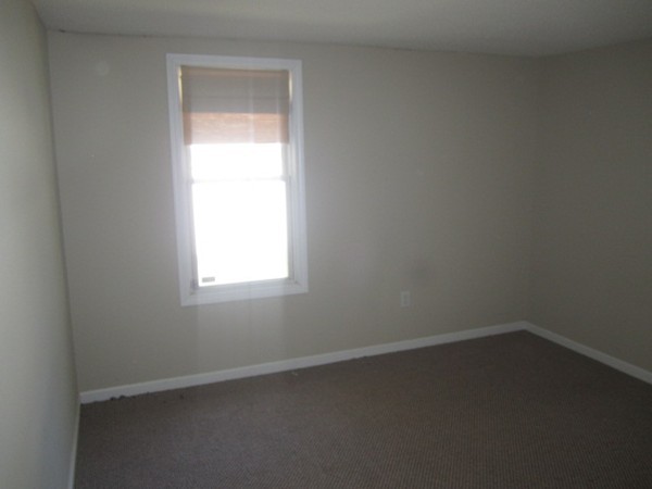 93 Stuart Street Springfield, MA 01119 - Photo 14 of 24 an empty room with a window