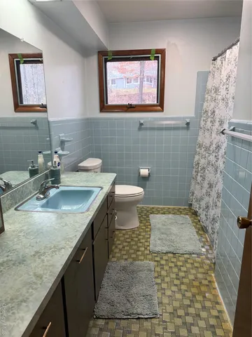 a bench sitting in middle of room