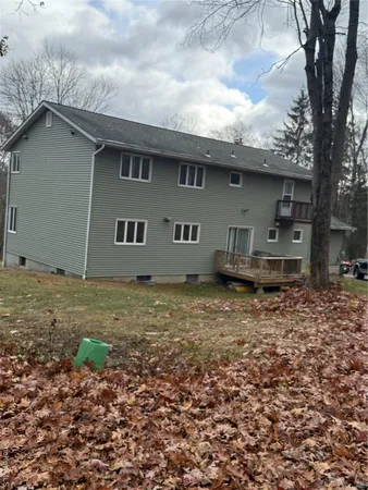 a house view with a backyard space
