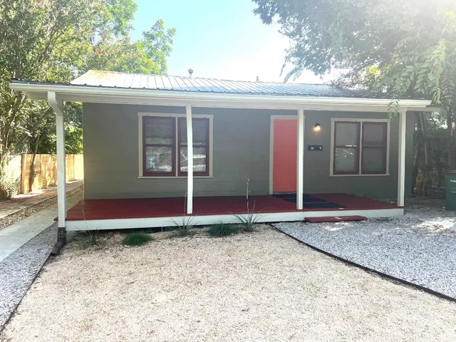 a house view with a backyard space
