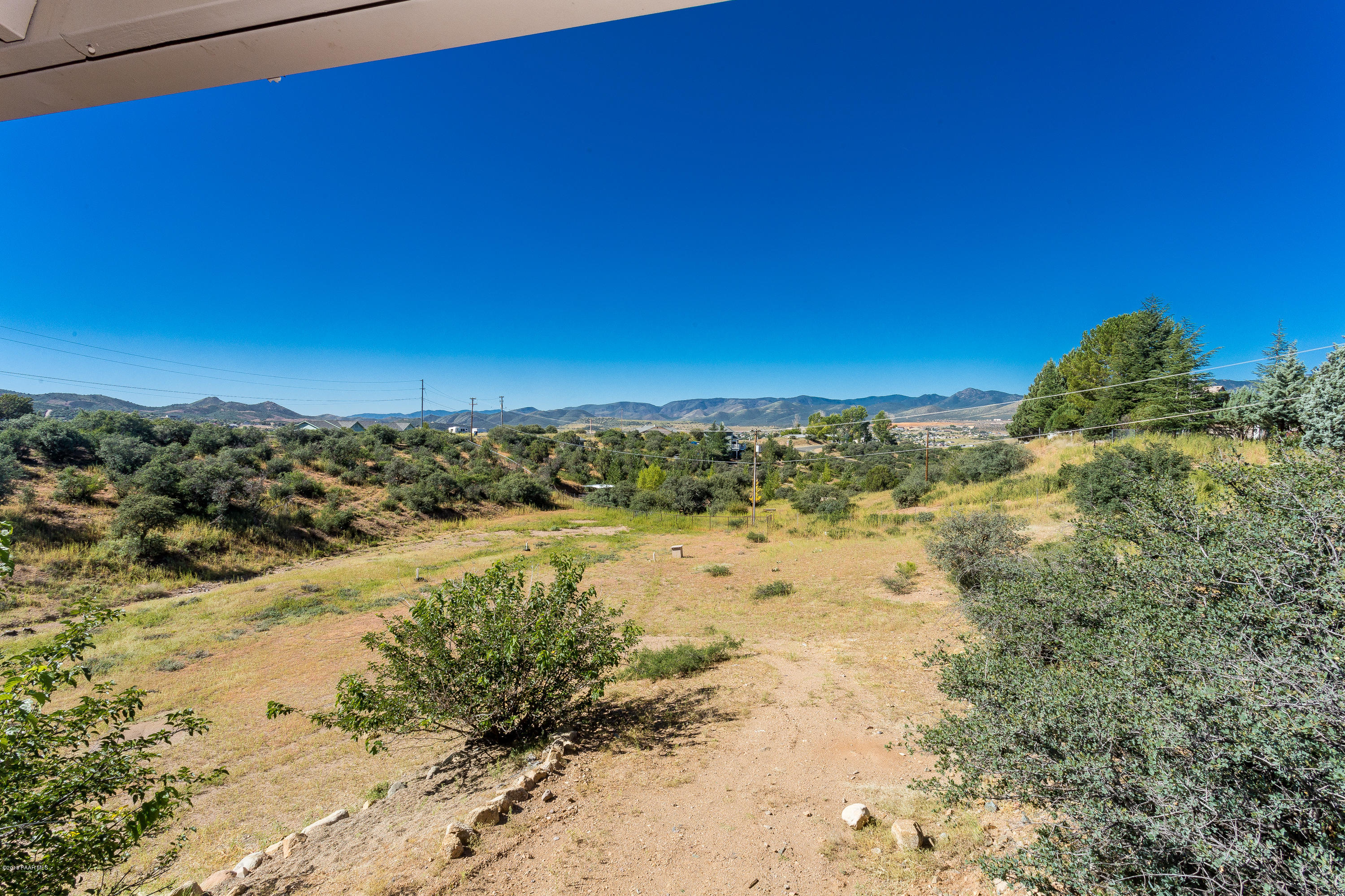 14135 East Blue Ridge Road Dewey-Humboldt, AZ 86327 - Photo 33 of 48 Fenced Backyard