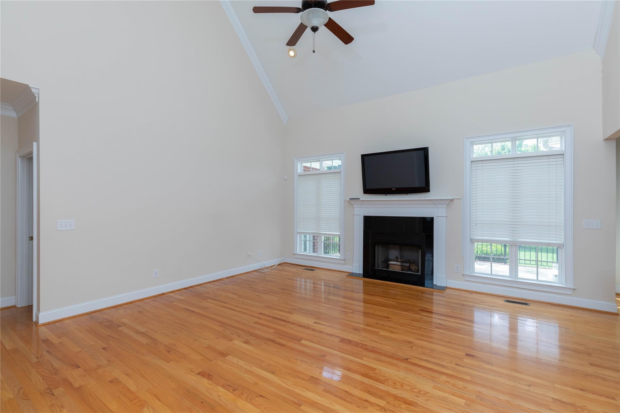 533 Mason Dickson Road York, SC 29745 - Photo 11 of 48 a view of empty room with fireplace and wooden floor