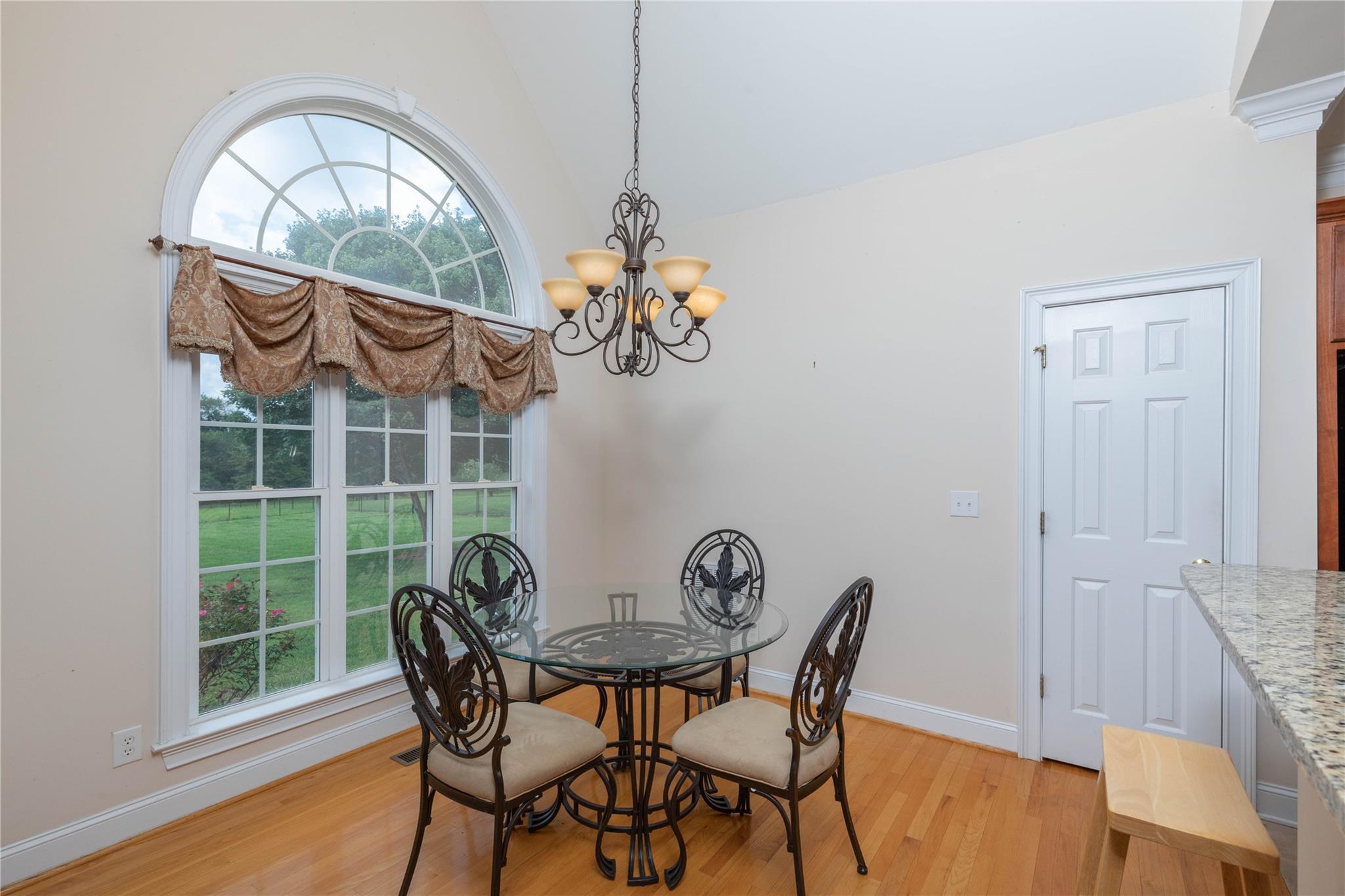 533 Mason Dickson Road York, SC 29745 - Photo 14 of 48 a view of a dining room with furniture window and wooden floor
