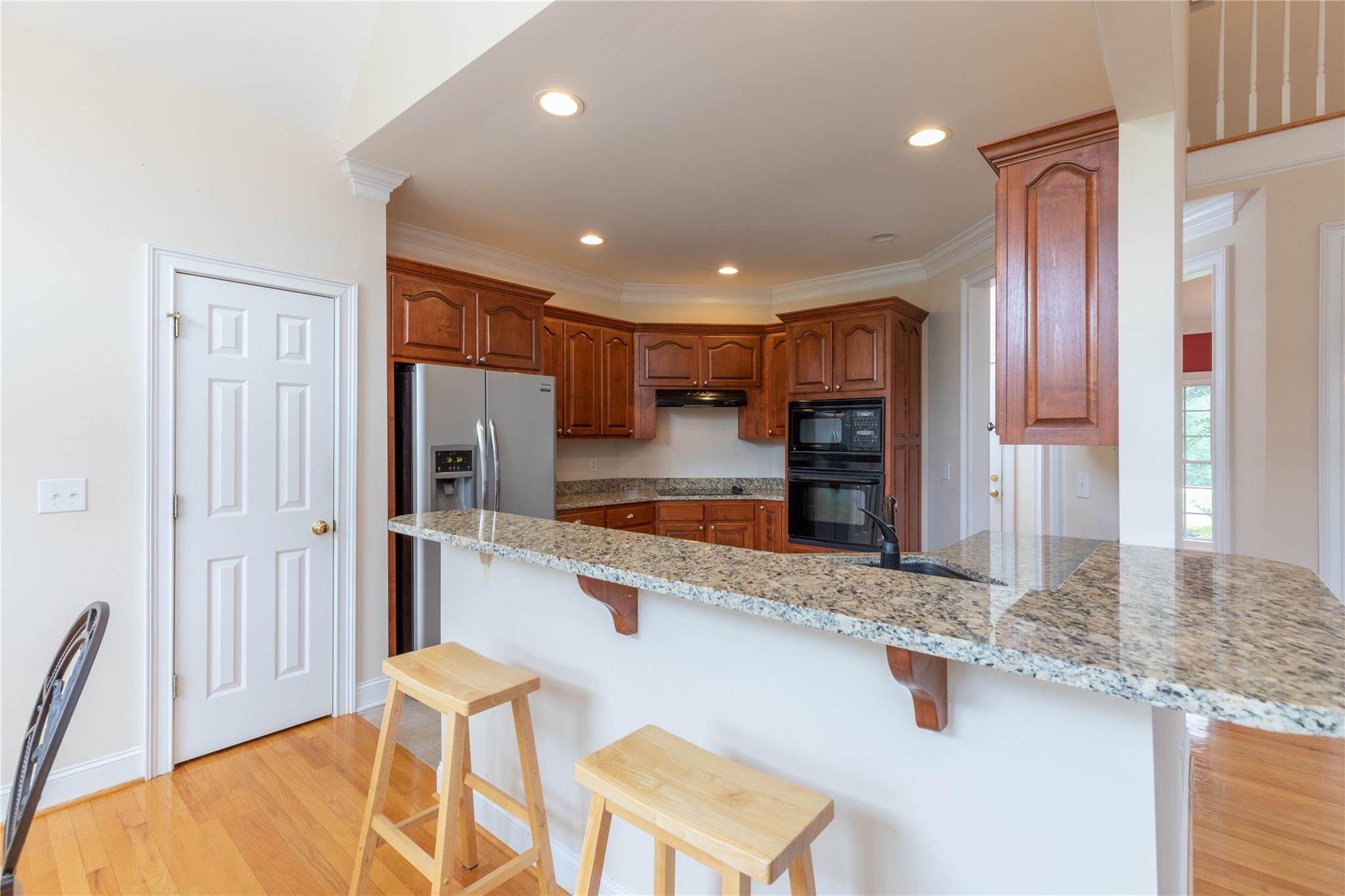533 Mason Dickson Road York, SC 29745 - Photo 15 of 48 a large kitchen with stainless steel appliances granite countertop a granite counter tops and a refrigerator