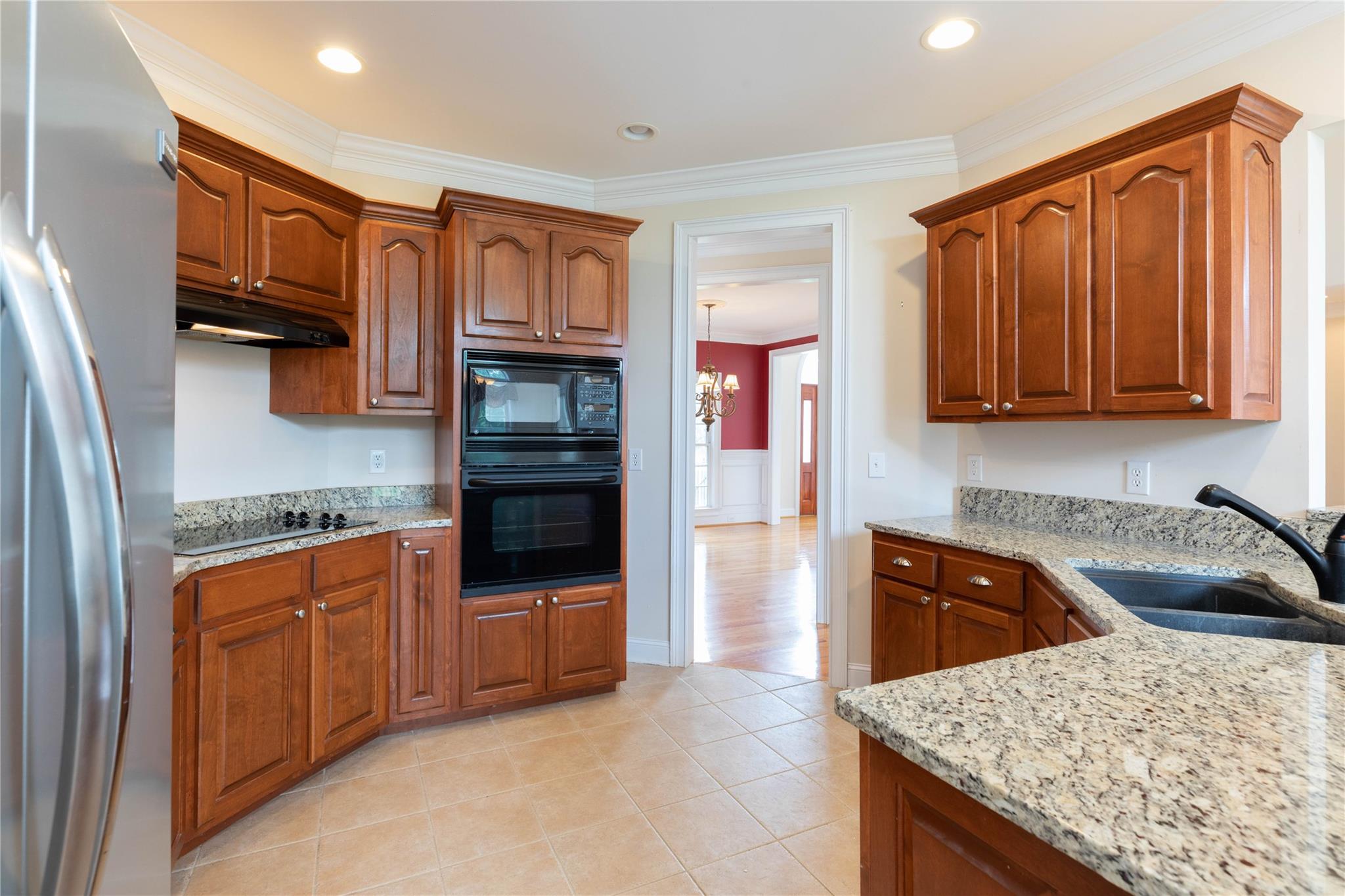 533 Mason Dickson Road York, SC 29745 - Photo 17 of 48 a kitchen with stainless steel appliances granite countertop a refrigerator and a stove top oven