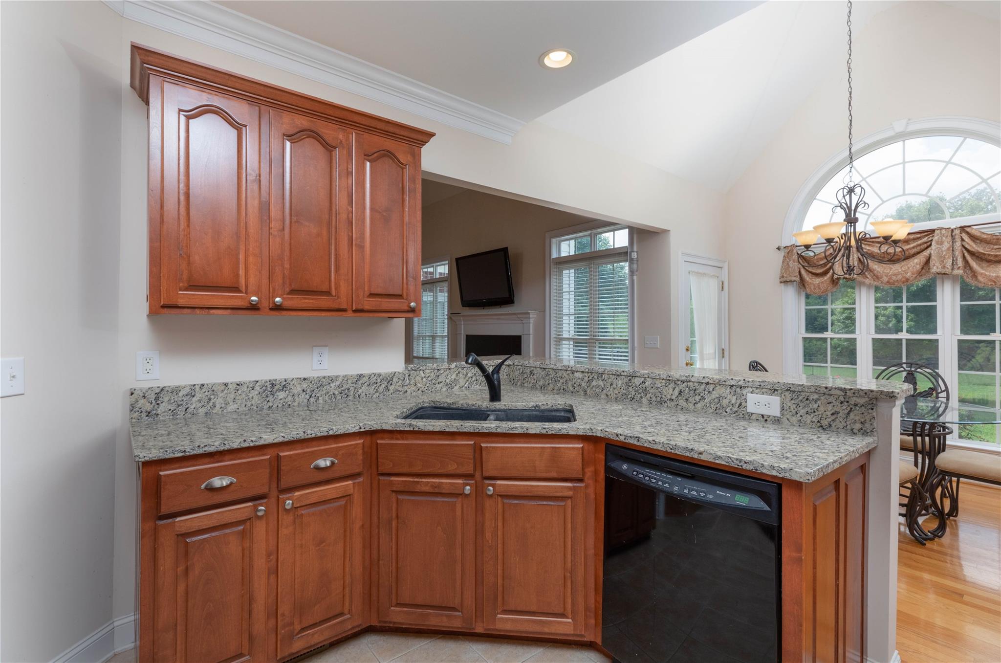 533 Mason Dickson Road York, SC 29745 - Photo 18 of 48 a kitchen with cabinets and chandelier