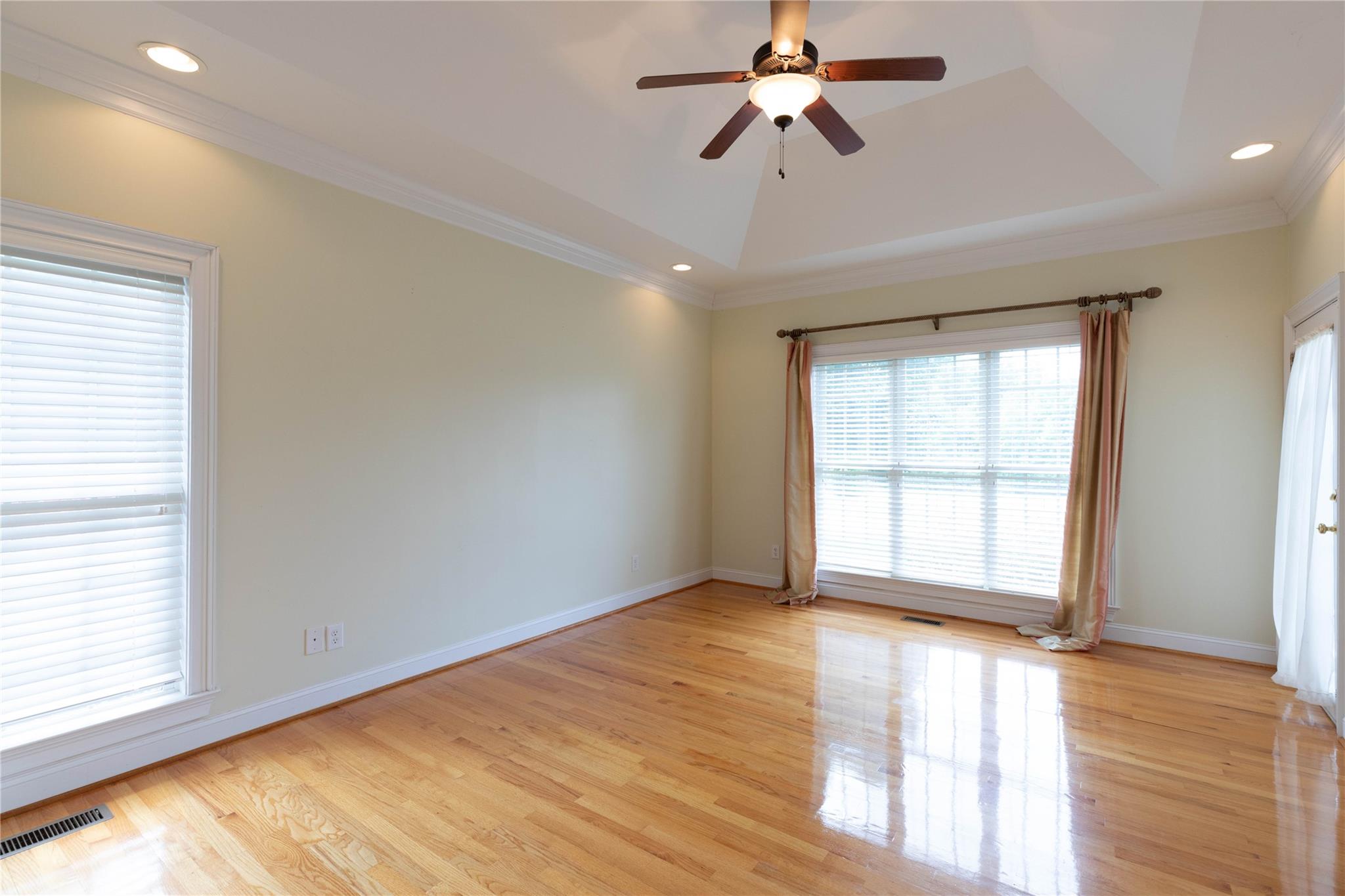 533 Mason Dickson Road York, SC 29745 - Photo 22 of 48 a view of empty room with wooden floor and fan