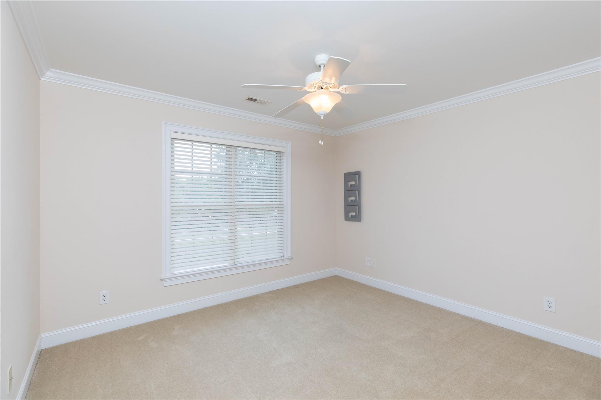 533 Mason Dickson Road York, SC 29745 - Photo 29 of 48 an empty room with a window and a fan