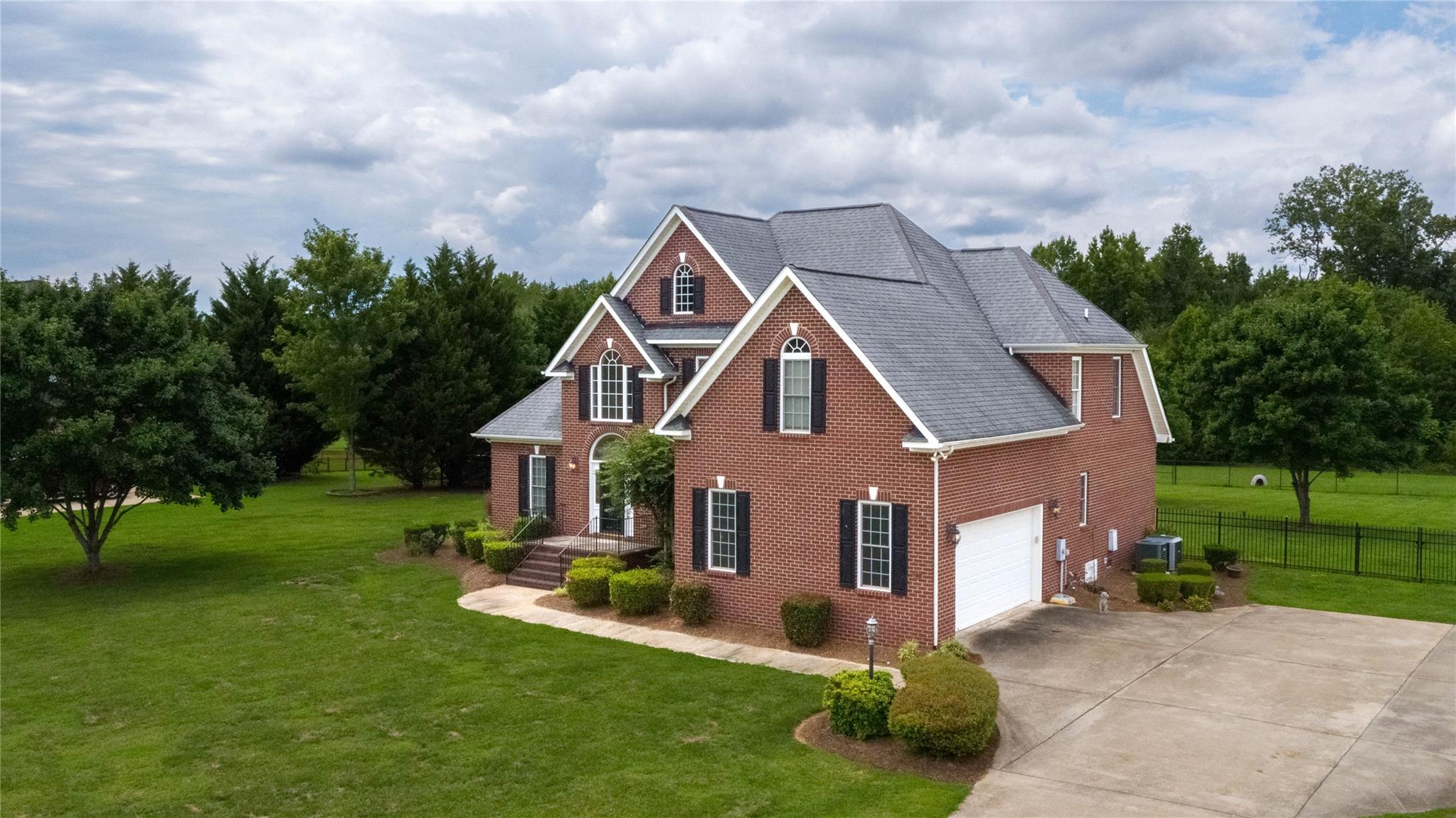 533 Mason Dickson Road York, SC 29745 - Photo 33 of 48 a front view of house with yard and green space