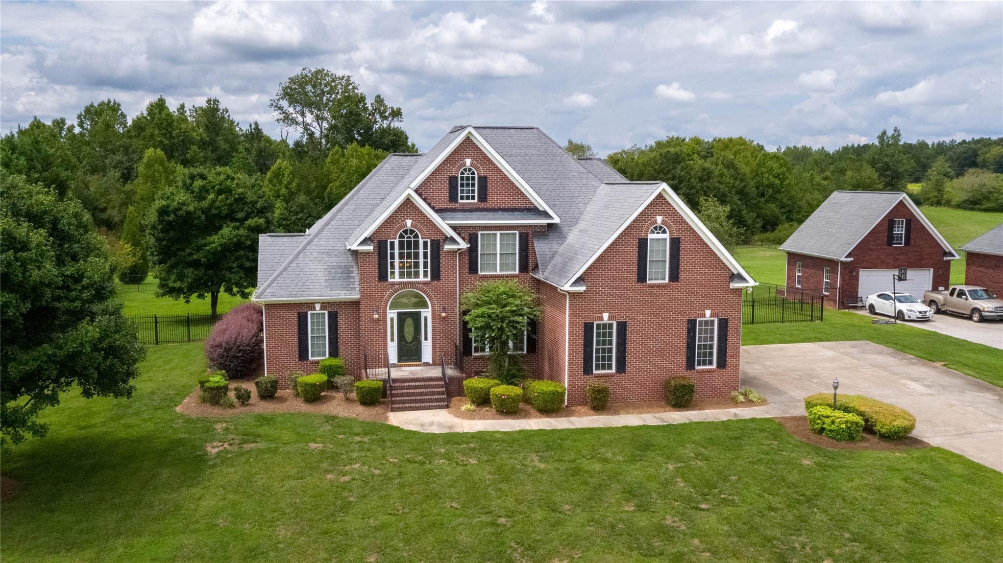 533 Mason Dickson Road York, SC 29745 - Photo 35 of 48 a front view of house with yard and green space