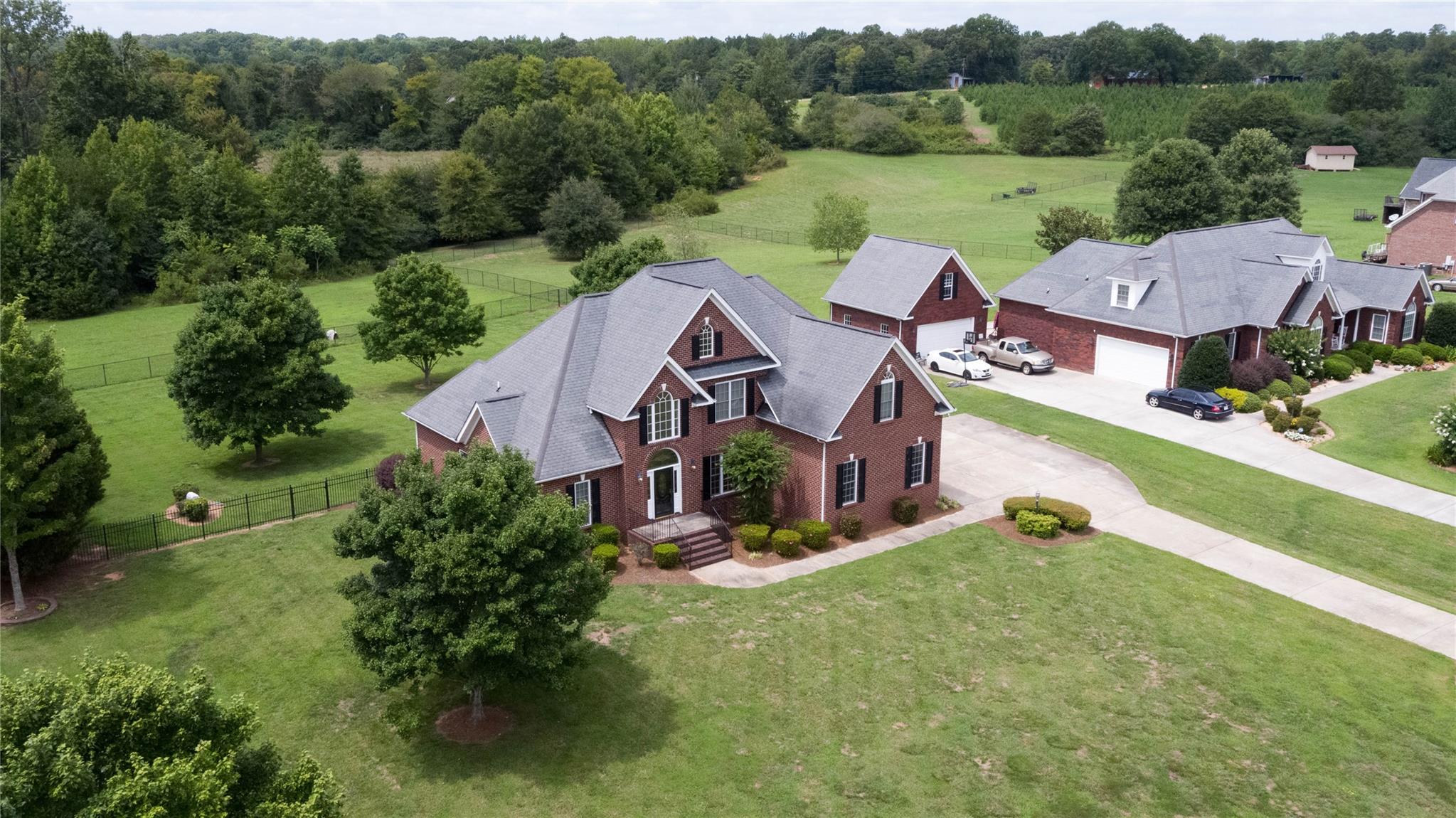 533 Mason Dickson Road York, SC 29745 - Photo 38 of 48 an aerial view of a house with garden space and street view