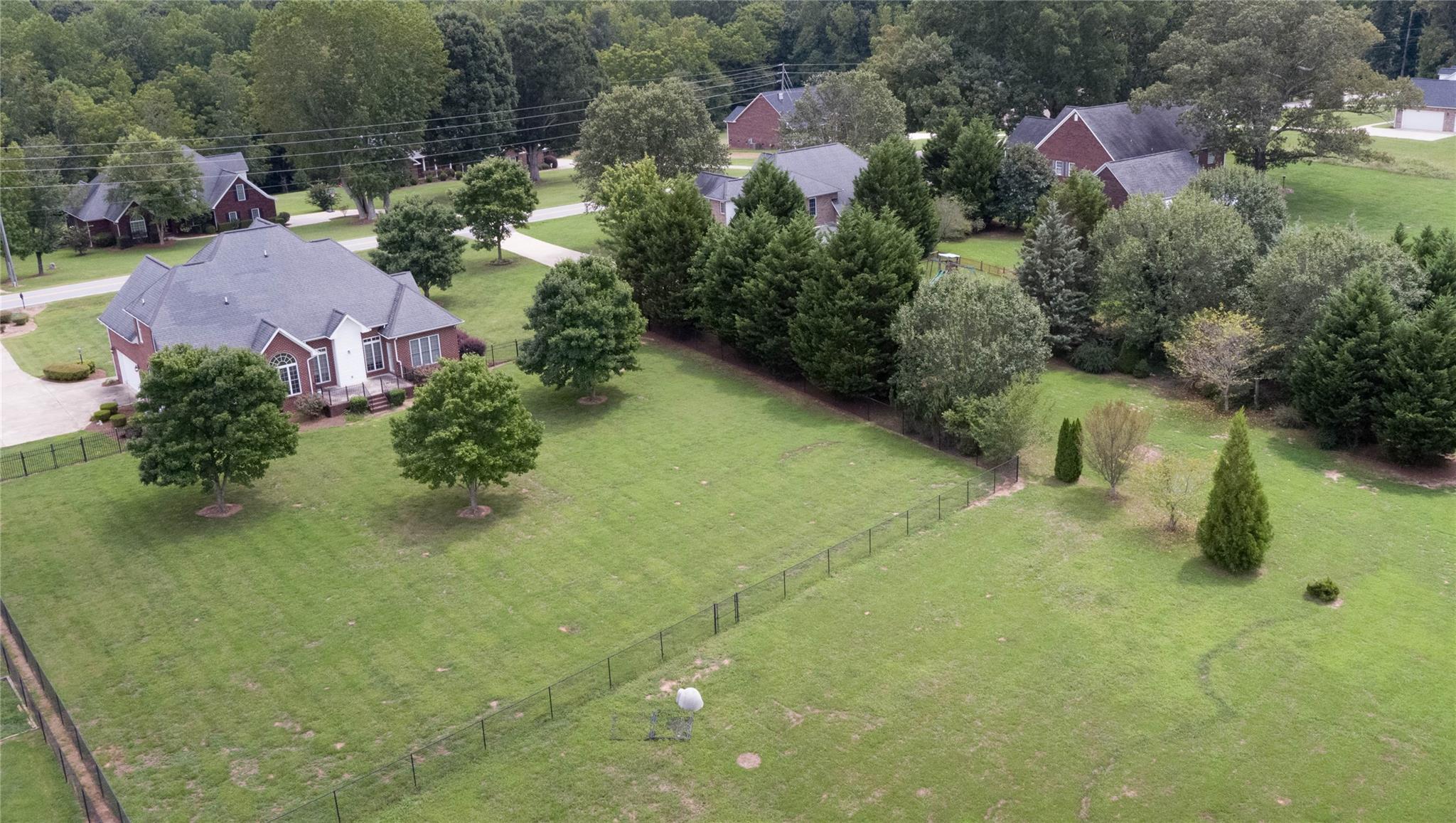 533 Mason Dickson Road York, SC 29745 - Photo 41 of 48 an aerial view of residential house with outdoor space and trees all around