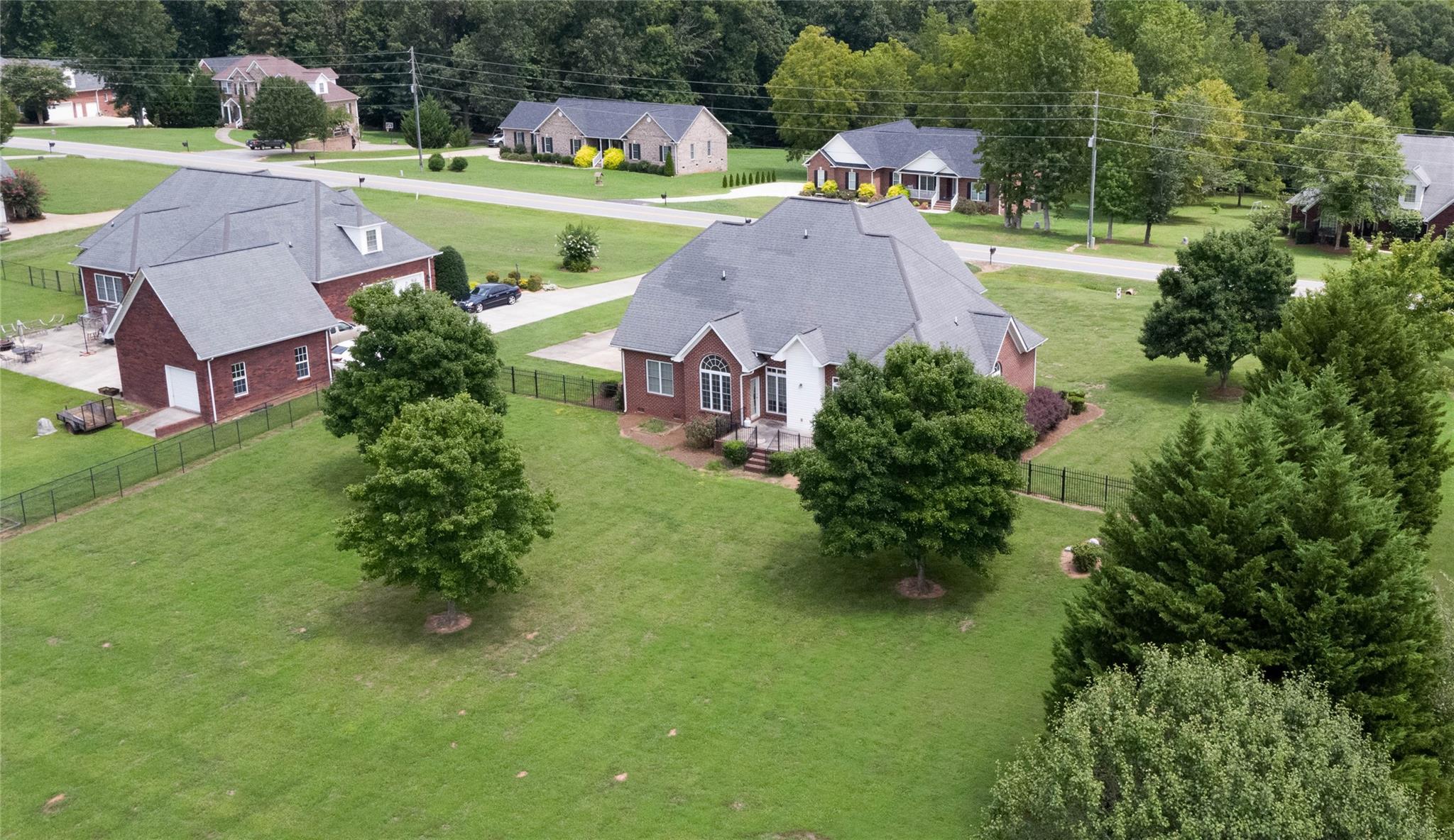 533 Mason Dickson Road York, SC 29745 - Photo 44 of 48 an aerial view of a house with outdoor space and trees all around