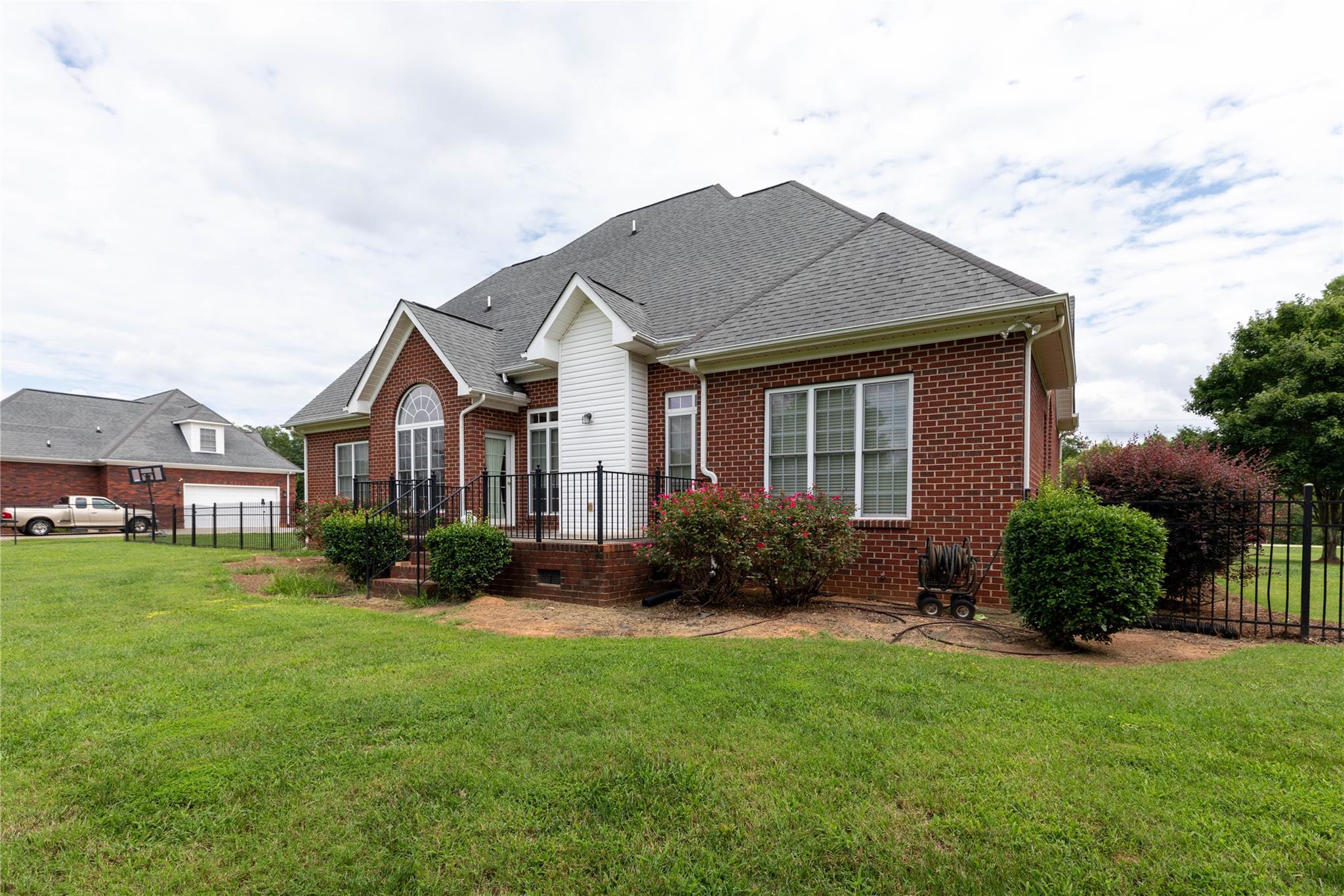 533 Mason Dickson Road York, SC 29745 - Photo 6 of 48 a front view of a house with a yard and potted plants