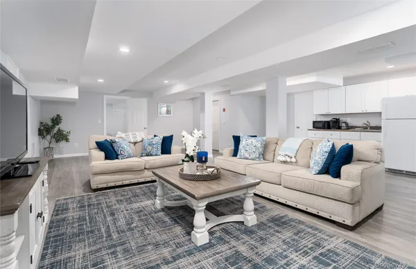 a living room with furniture and a couch