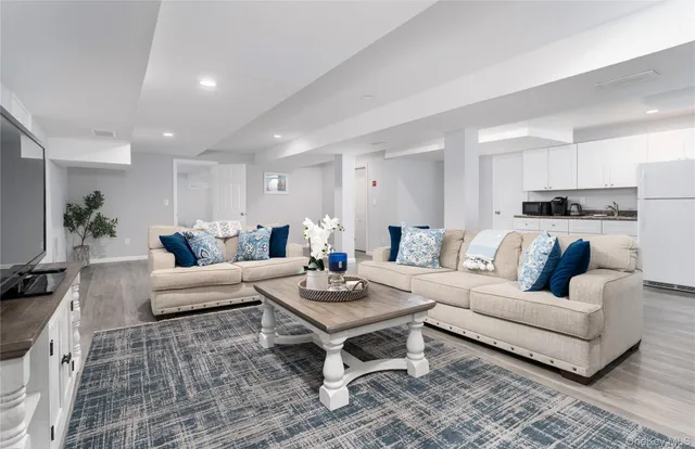 a living room with furniture and a couch