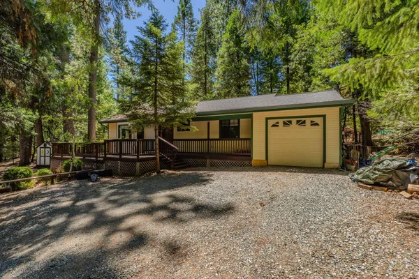 a house with trees in front of it