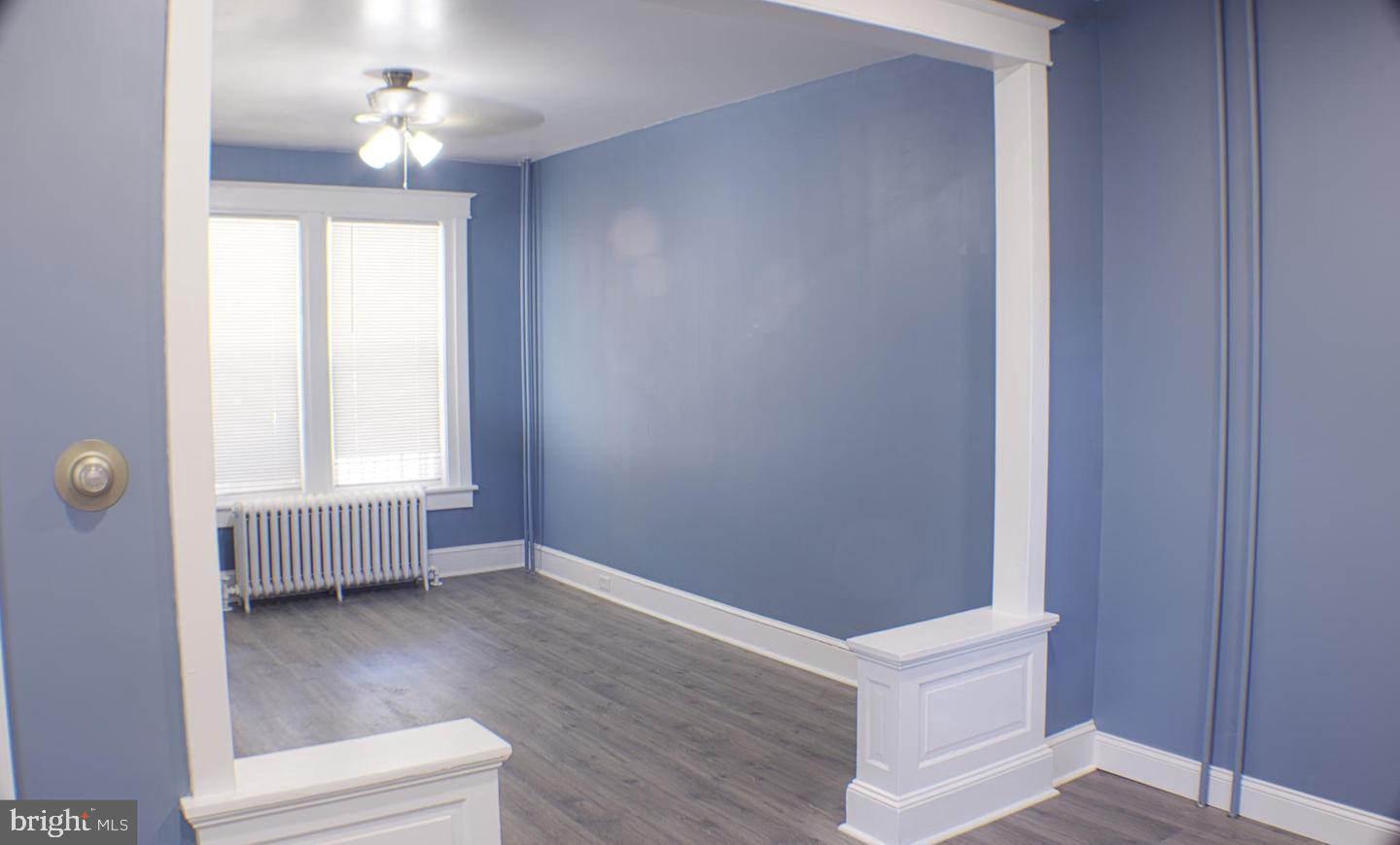 426 Adams Street Pottsville, PA 17901 - Photo 2 of 10 Bright and airy space with blue walls.