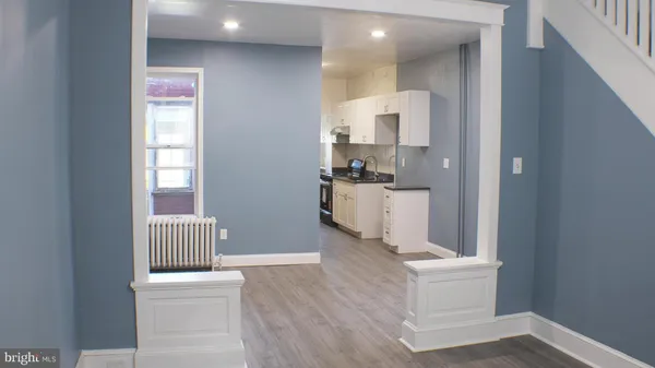 a kitchen with a sink and a stove