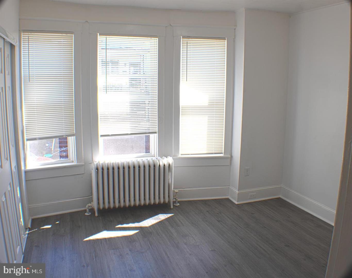 426 Adams Street Pottsville, PA 17901 - Photo 7 of 10 Bright, airy corner room with natural light.